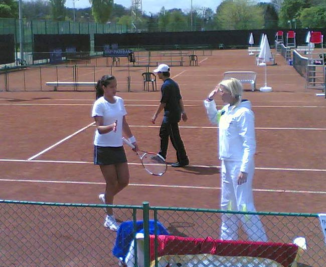 Ana Ivanovic beat the Danish No.1, 15 years old, Caroline Wozniacki (464 number in WTA ranking) 6:3 6:0.   Ana Ivanovic is congratulated by the Serbian captain .