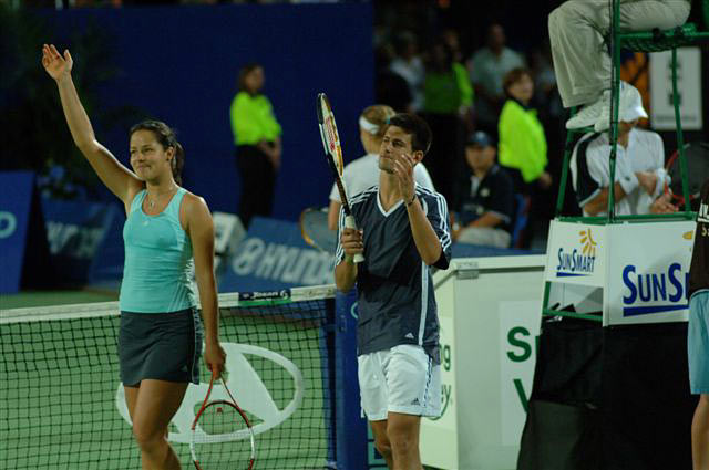 Ana Ivanovic (L) of Serbia and Montenegro and Novak Djokovic during their mixed doubles match against Svetlana Kuznetsova and Yuri Schukin of Russia during the Hopman Cup in Perth, Australia January 5, 2006. Serbia and Montenegro the match 6-2 7-6.