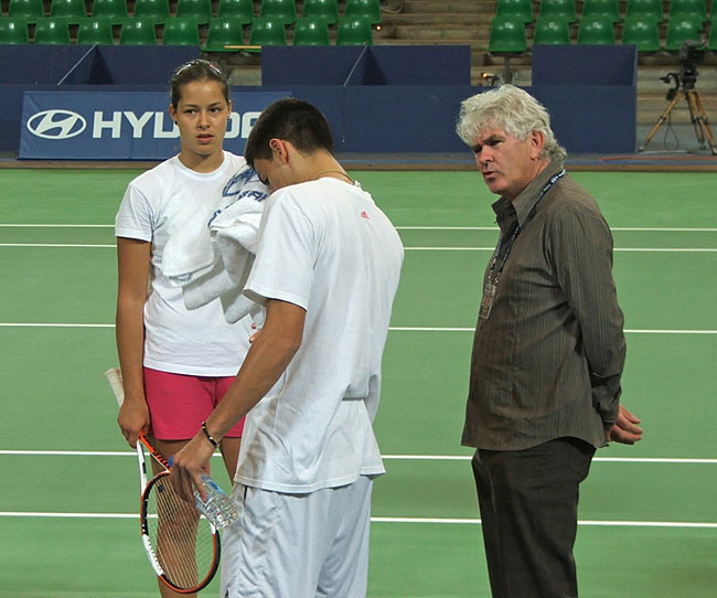 Ana Ivanovic , her manager Zoltan Kuharsky and Novak Djokovic on the practice before the Hopman Cup in Perth, Australia.     