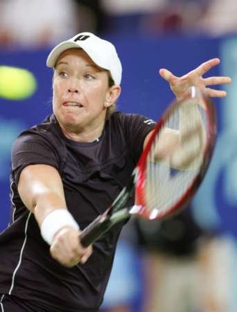 Lisa Raymond of the U.S. plays a backhand shot during the women's singles match against Serbia and Montenegro's Ana Ivanovic during the 18th Hopman Cup in Perth, Australia January 1, 2006. Ivanovic won the match 6-2 6-4. 