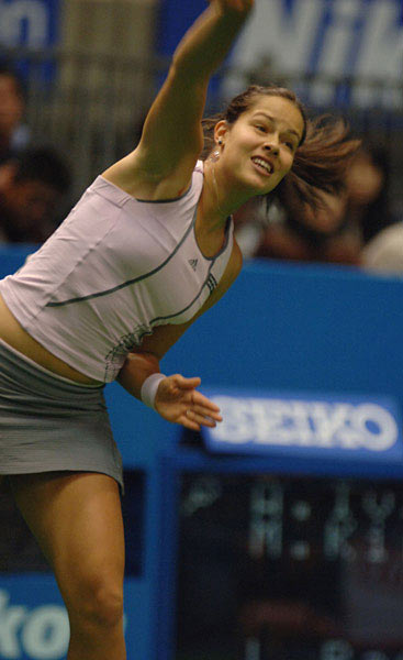 Ana Ivanovic serves a ball during the quarter final doubles match. Ana Ivanovic and Maria Kirilenko won an international pair Angelique Widjaja (INA) and Zheng Jie (CHN) with score 6:0 2:6 6:1.